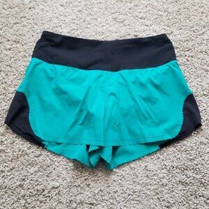 Lululemon athletica Smooth Stride Viridian Green & Black Shorts.